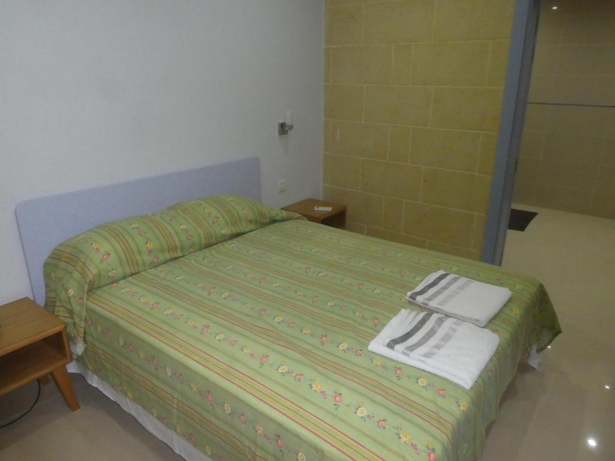 Country Inn Sannat Exterior foto